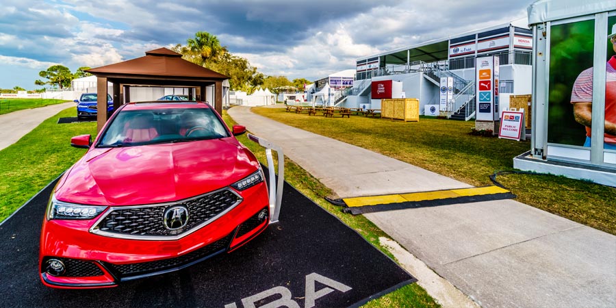 Acura car parked near golf course