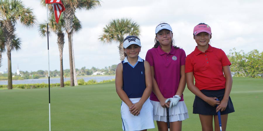 Junior golfers on course
